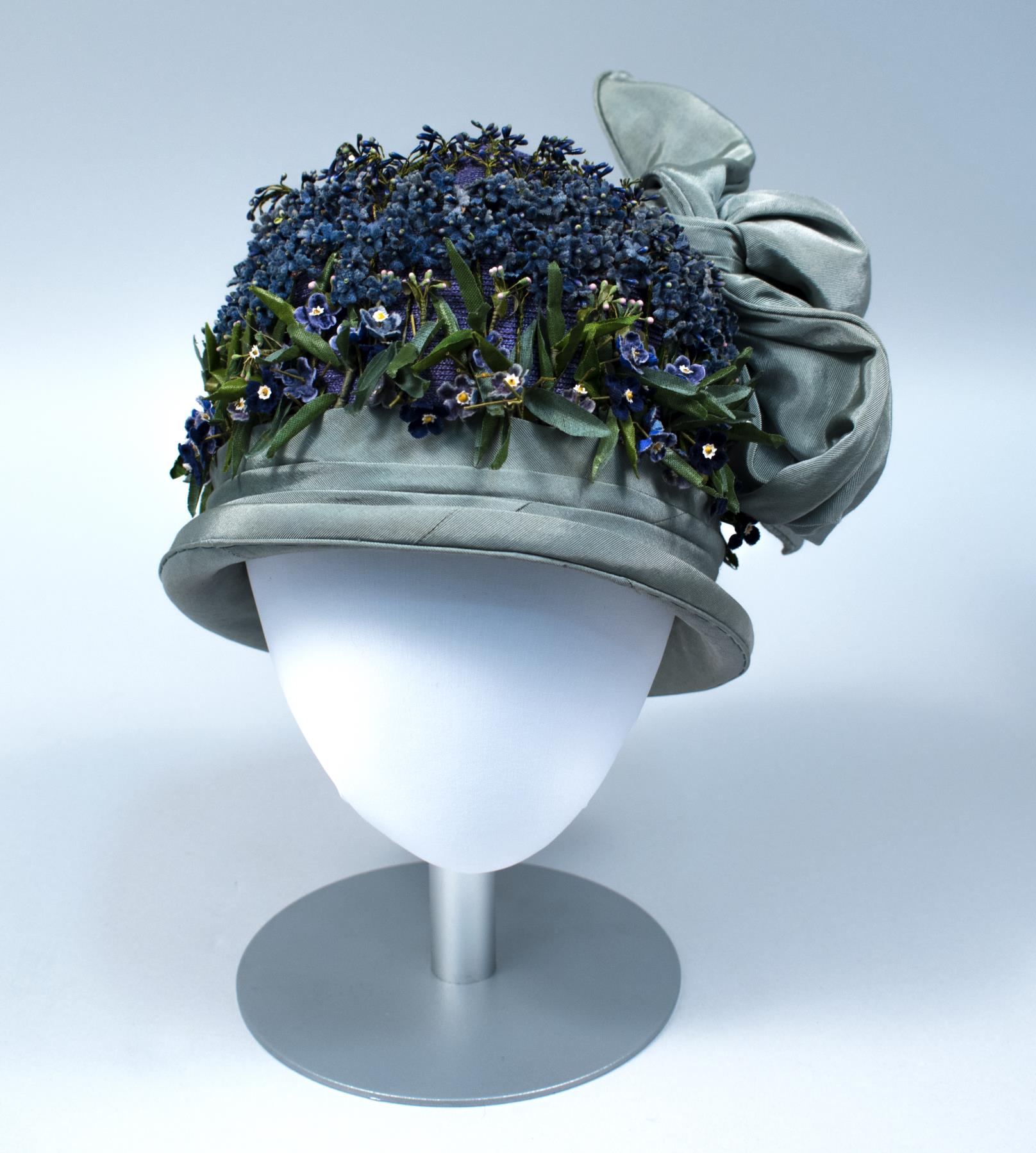 Image of Straw cloche with ribbon and fabric violet trim, 1920s